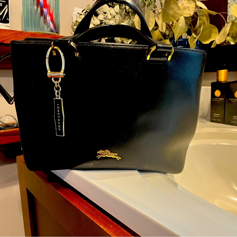 Longchamp vintage handbag is great shape.